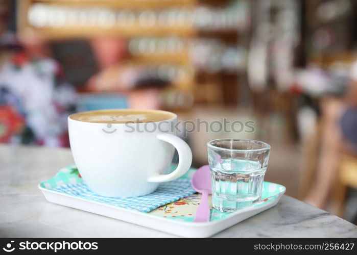 cappuccino coffee on wood background