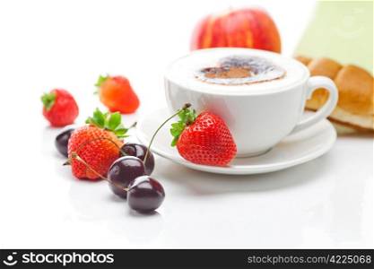 cappuccino in a cup in the shape of hearts,cherry,apple ,croissant and strawberries isolated on white