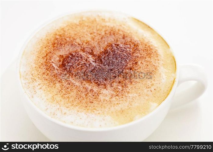 cappuccino in a cup in the shape of hearts isolated on white