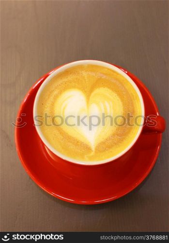 Cappuccino or latte coffee with heart shape