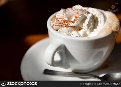 Cappuccino With Fresh Whipped Cream And Cinnamon On Top