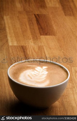 Cappuccino with latte art and copy space room