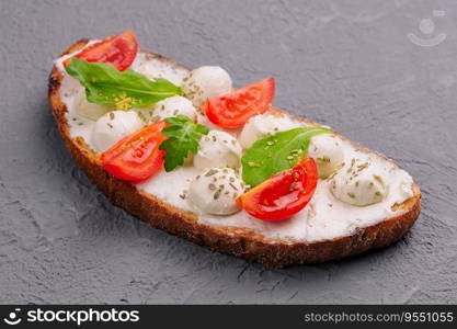 Caprese bruschetta toasts with cherry tomatoes