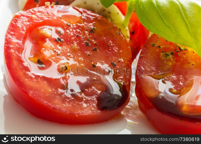 Caprese salad tomato mozzarella with basil.. Caprese salad tomato mozzarella with basil