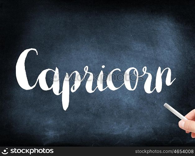 Capricorn written on a blackboard
