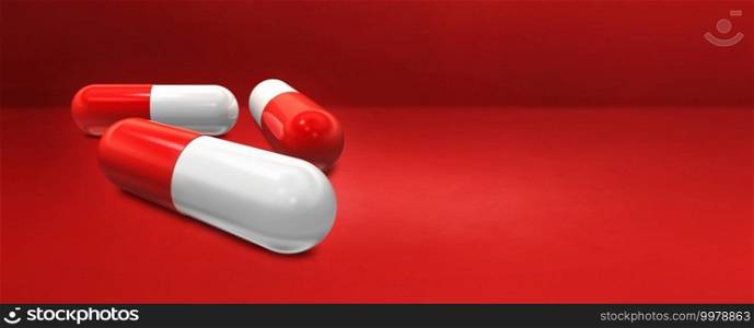 Capsule pill isolated on a red studio banner. 3D illustration. Capsule pill on a red studio banner