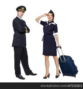 Captain of the aircraft and a beautiful flight attendant in a dark blue uniform, isolated on white background