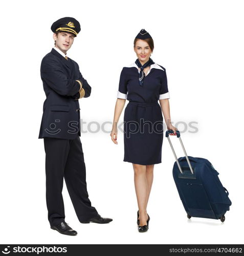 Captain of the aircraft and a beautiful flight attendant in a dark blue uniform, isolated on white background