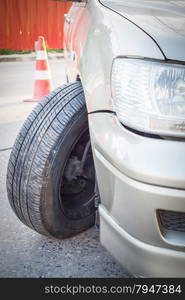 Car crash accident, impact to front wheel axle and bumper is broken cannot drive, insurance concept