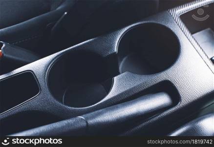 Car cup holder in center console of the car