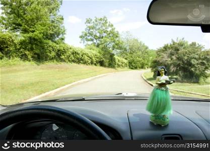 Car dashboard and trees