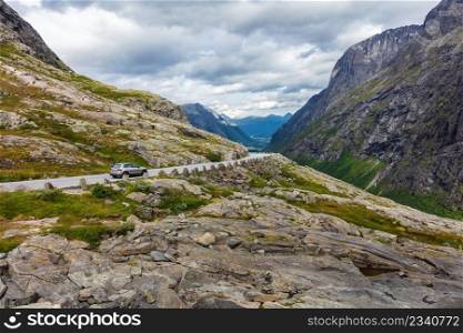 car driving on a mountain road. Norway