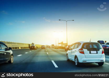 Car driving on highway road,car on road and sunset background,Transportation