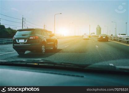 Car driving on highway road,Car parked on road and Small passenger car seat on the road used for daily trips