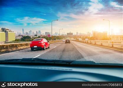Car driving on highway road in the city