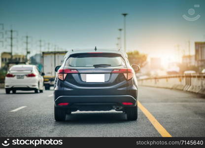 Car Driving on road and Small passenger car seat on the road used for daily trips