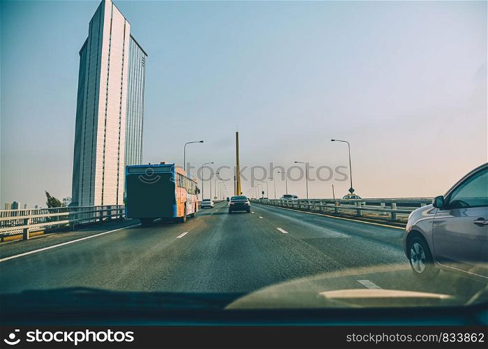 Car Driving on road and Small passenger car seat on the road used for daily trips
