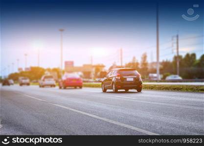 Car driving on road,Car on high way road and sunlight background