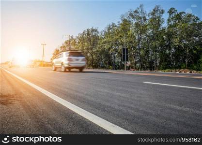 Car driving speed fast on road