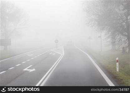 Car driving the Fog Road background