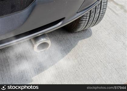 Car exhaust while leaving a smoke.