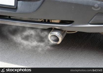 Car exhaust while leaving a smoke.