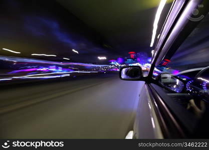 car fast drive on highway in night