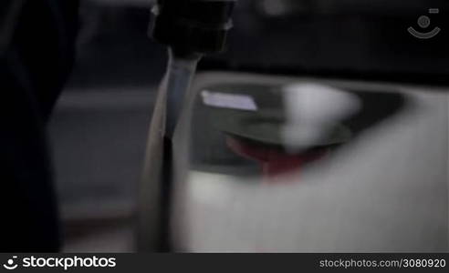 Car glass replacement at an auto repair shop