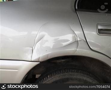car has a dented rear bumper after an accident