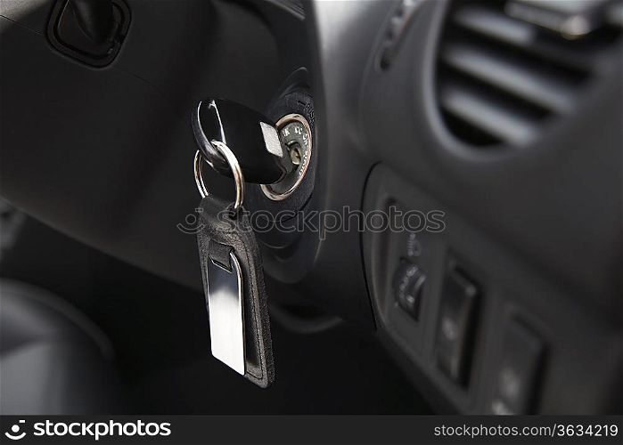 Car ignition with key, close-up