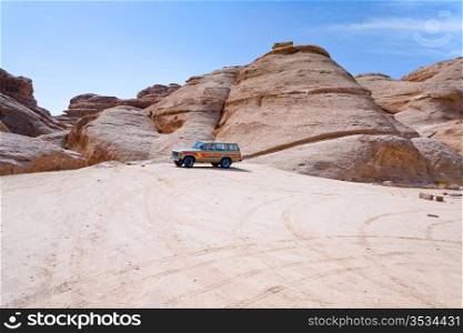 car in Wadi Rum dessert mountain, Jordan