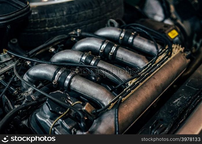 Car intake manifold with rubber and metal pipes