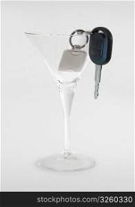 Car key in a drink glass.