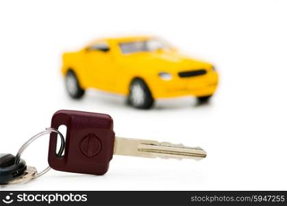 Car keys and car at background isolated on white&#xA;