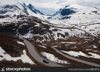 car on a mountain road at the Norway