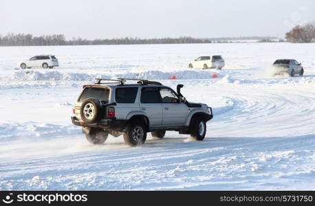 Car on winter road.