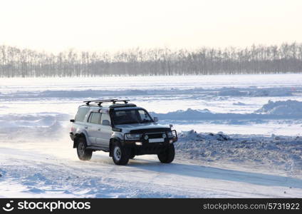 Car on winter road.