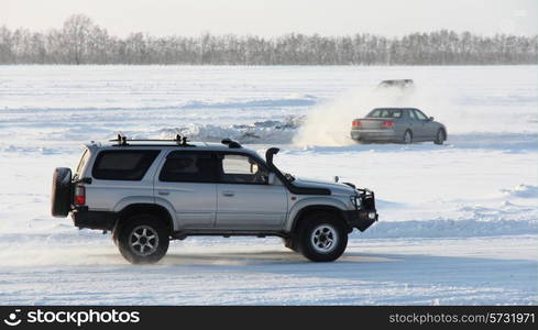 Car on winter road.