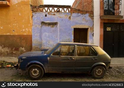 Car parked in front of a house, Mexico