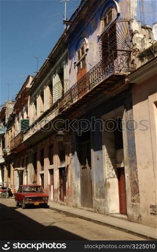 Car parked outside a building structure, Havana, Cuba