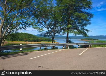 car parking on Kaeng Krachan Dam background
