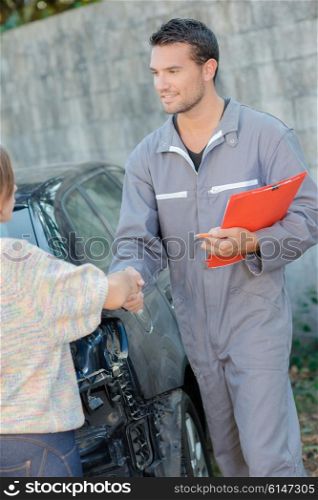 Car specialist with a customer