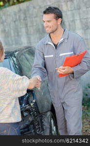 Car specialist with a customer