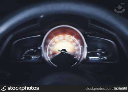Car speedometer high performance and indicator sweeping to max power speed,dashboard car motion,double exposure automotive concept