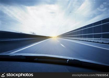 Car view with motion blur road background