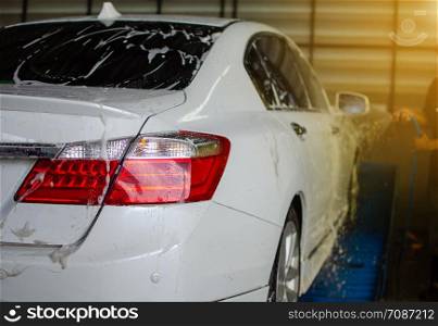 Car wash with foam in car wash