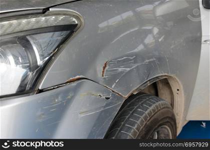 car with accident damaged front. car bumper damage