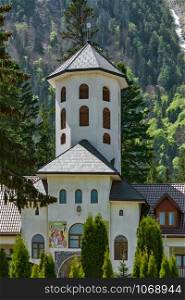 Caraiman Monastery Church at the Foot of the Bucegi Mountains . Caraiman Monastery Church