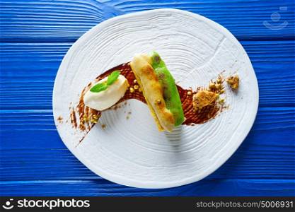 Caramelized cinnamon and pistachio cream millefeuille dessert
