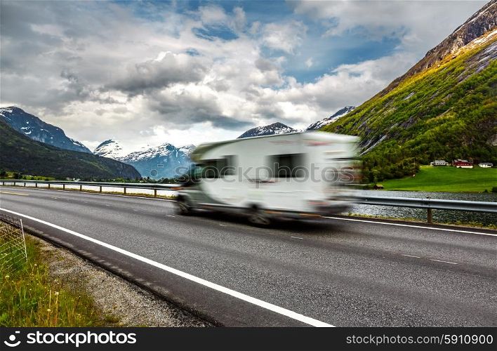 Caravan car travels on the highway. Caravan Car in motion blur.